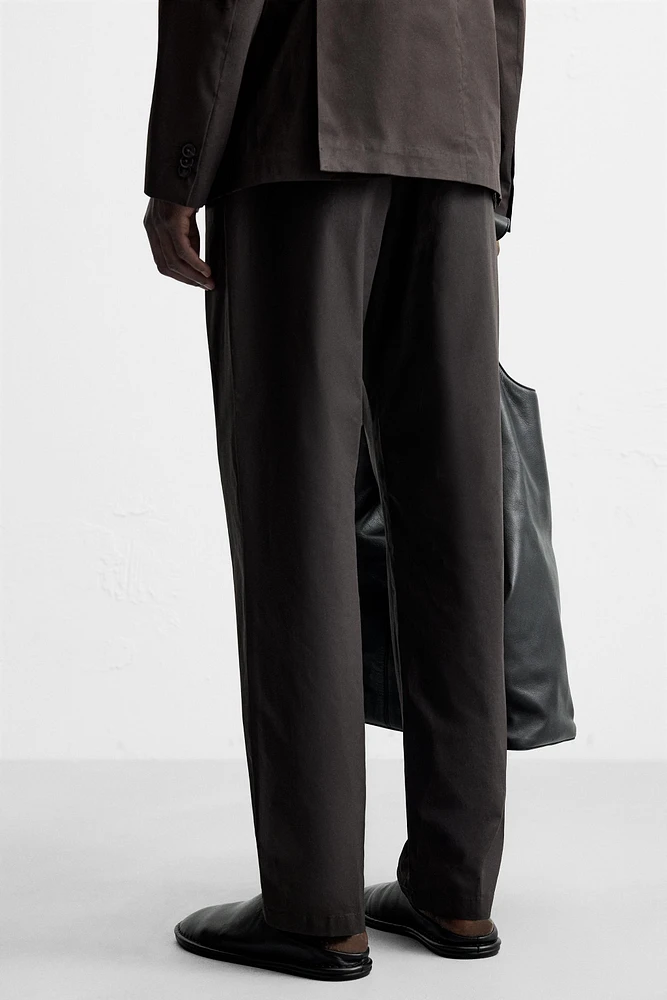 WAXED EFFECT SUIT PANTS