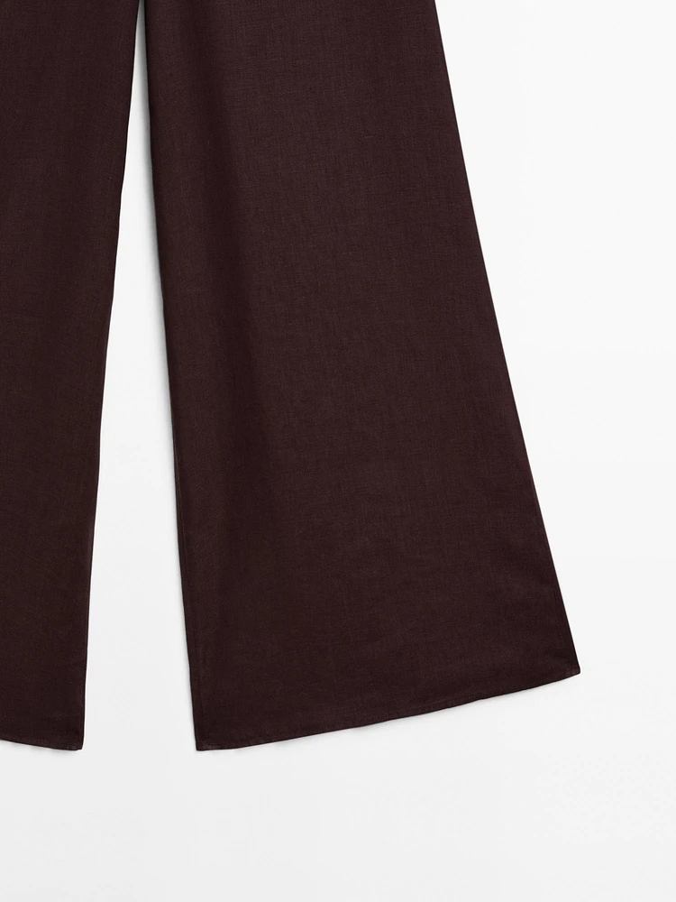 Straight-fit linen trousers with an elasticated waistband
