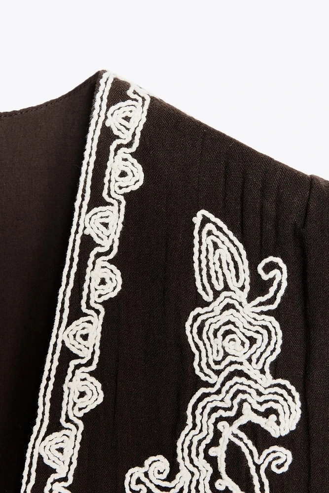 EMBROIDERED OPEN VEST