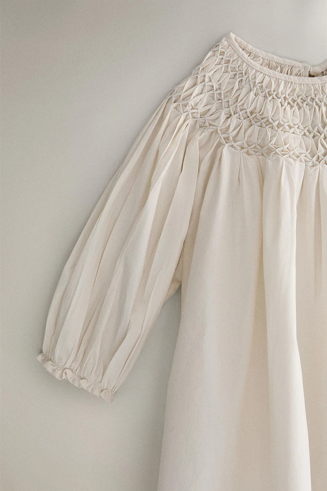 ROBE ENFANT NID D’ABEILLE