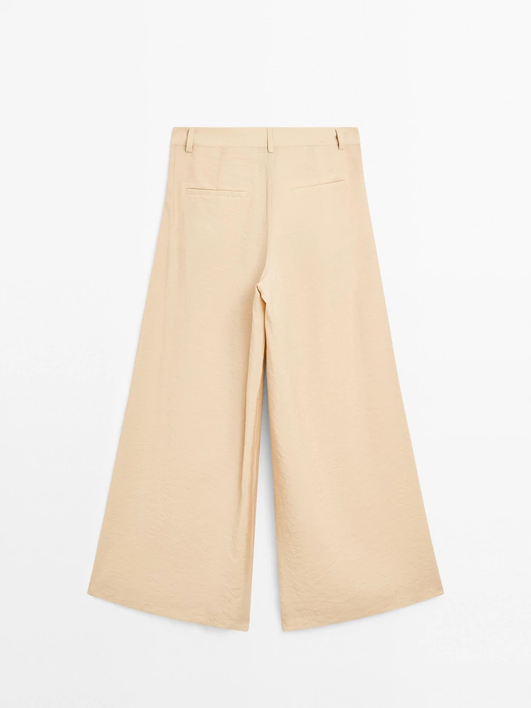 Pantalon palazzo à pinces