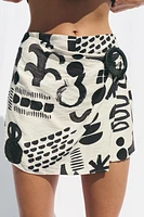 MINI-JUPE IMPRIMÉE BOUCLE