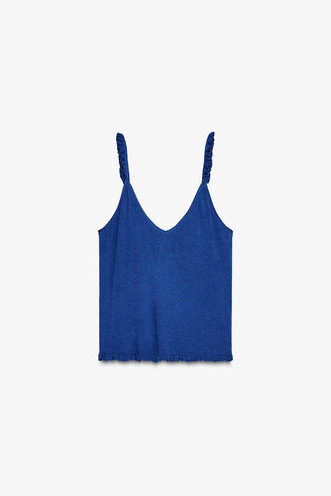 TOP EN MAILLE À BRETELLES ET VOLANTS