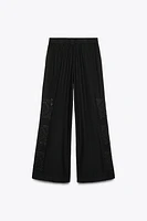 MULTI-PLEAT EMBROIDERED PANTS