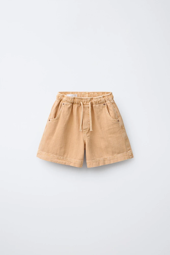 SHORT À TAILLE PLISSÉE