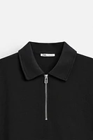 ZIPPERED INTERLOCK POLO SHIRT