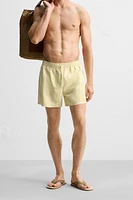 MAILLOT DE BAIN MI-LONG À IMPRIMÉ GÉOMÉTRIQUE