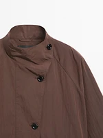 Trench fluide en tissu déperlant