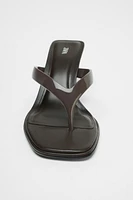 ASYMMETRIC HEELED SANDALS