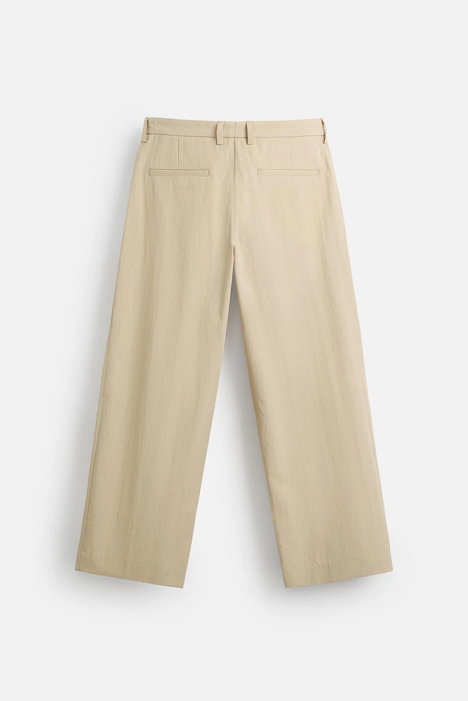 LIMITED EDITION RELAXED FIT PLEATED PANTS