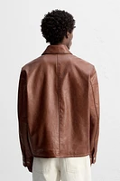 BLOUSON EN CUIR DÉLAVÉ