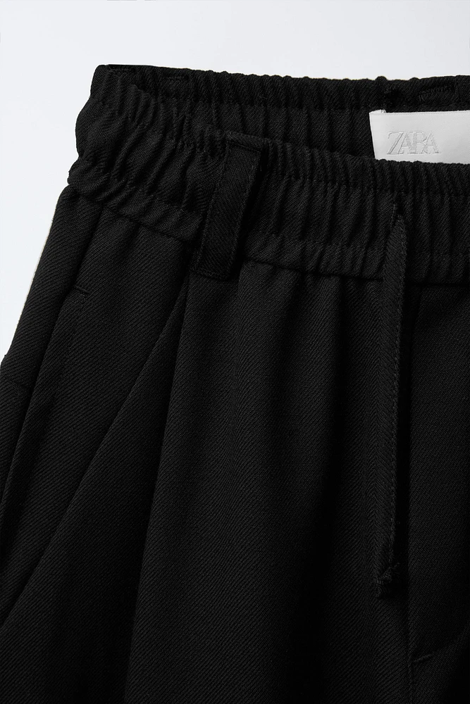 BAGGY PLEATED PANTS