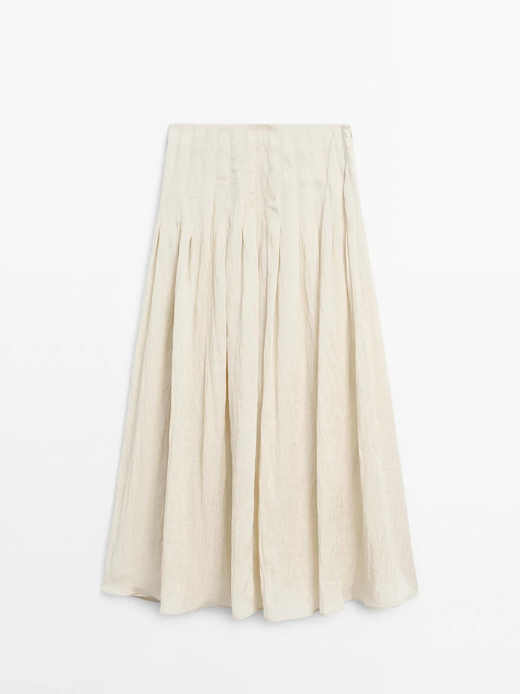 Flowing midi skirt with box pleats