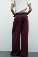 DOUBLE PLEAT BELTED PANTS