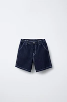 SHORT EN JEAN À ÉTIQUETTE