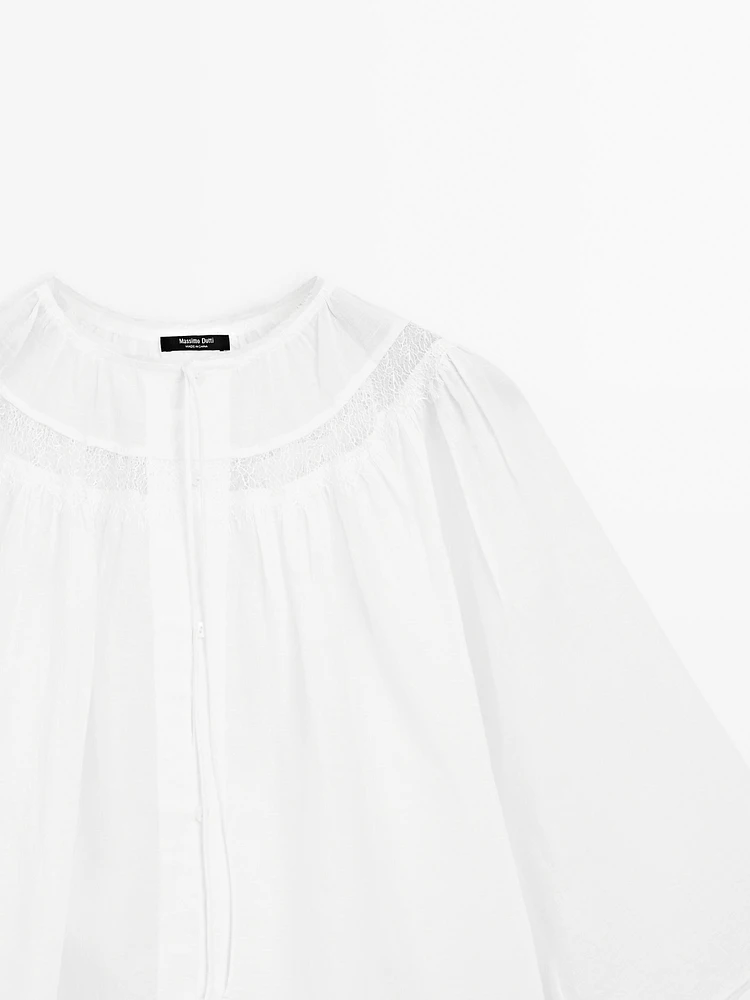 Flowing blouse with lace detail