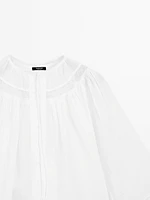 Flowing blouse with lace detail