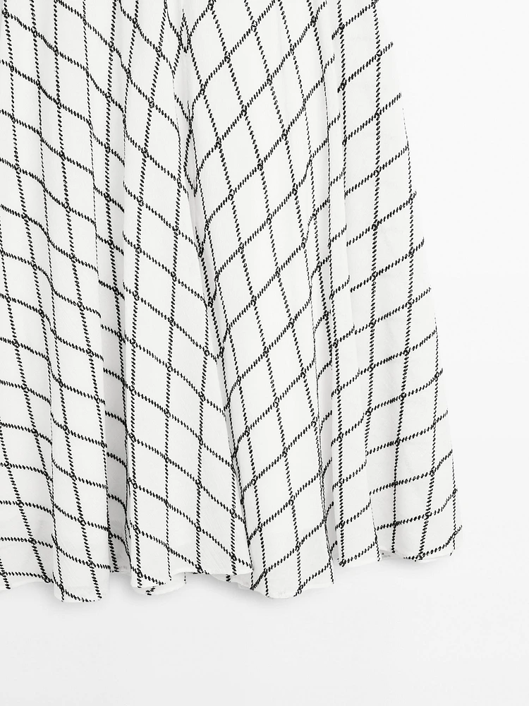 Jupe midi ample évasée à carreaux