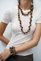 TWO-PACK OF WOODEN PIECE NECKLACES