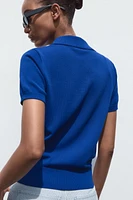 TOP POLO EN MAILLE À MANCHES COURTES