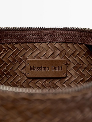 Sac seau tressé en cuir nappa