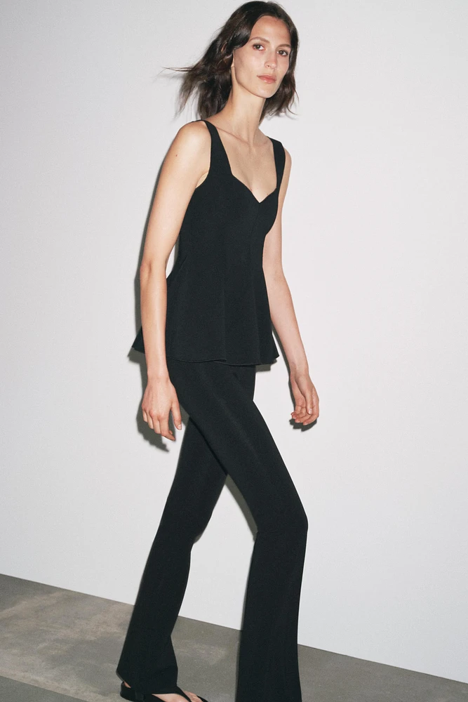 PEPLUM STRETCH TOP