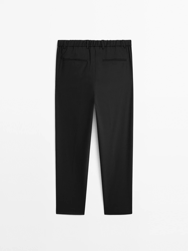 Relaxed fit trousers with darts