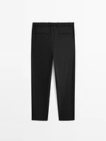 Relaxed fit trousers with darts