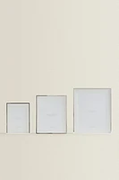 METAL PICTURE FRAME WITH A TIERED PASSE-PARTOUT