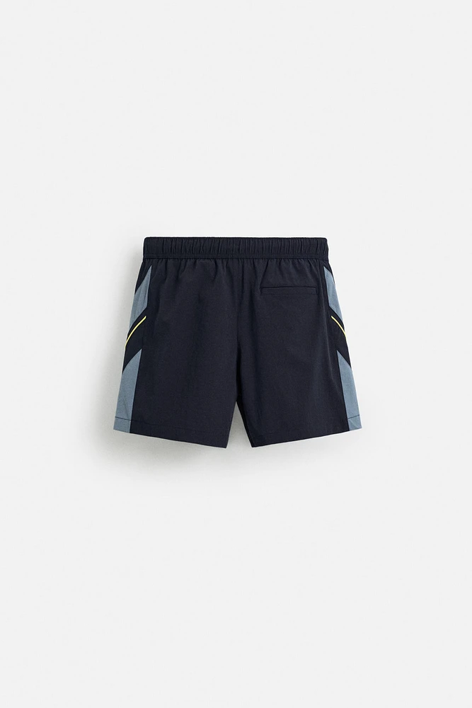 CONTRAST BANDS MID-LENGTH SWIMSUIT