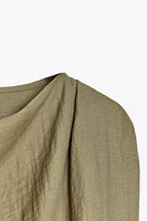 BLOUSE SANS MANCHES