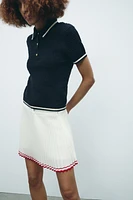 PLEATED MINI SKIRT