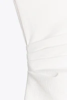 ROBE MI-LONGUE ASYMÉTRIQUE