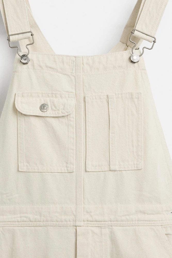 SALOPETTE EN DENIM POCHE DE CHARPENTIER