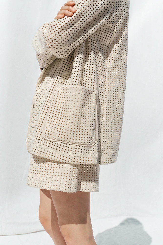 VESTE DÉCOUPÉE EFFET DAIM