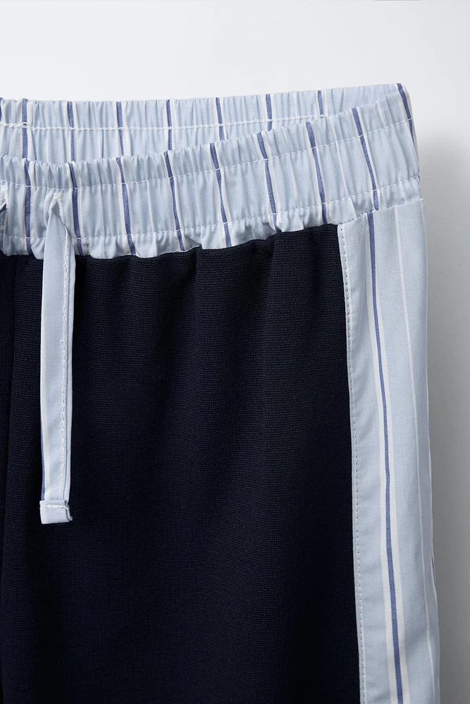 PANTALON JAMBES LARGES À BANDES RAYÉES
