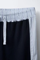 PANTALON JAMBES LARGES À BANDES RAYÉES