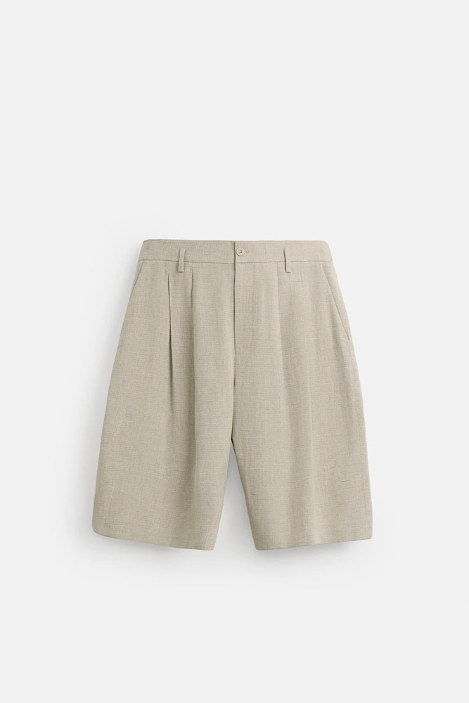 PLEATED WIDE FIT BERMUDA SHORTS