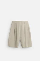 PLEATED WIDE FIT BERMUDA SHORTS