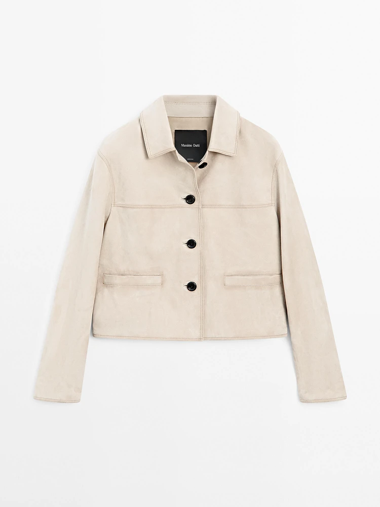 Veste courte à surpiqûres en cuir finition daim