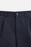 RELAXED FIT PLEATED SHORTS