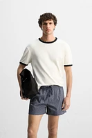GEOMETRIC PRINT SHORT SWIMMING TRUNKS