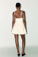 ROBE COURTE AVEC NŒUDS