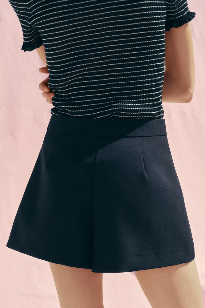 SPLIT SKIRT WITH BUTTONS