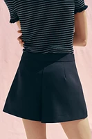 SPLIT SKIRT WITH BUTTONS