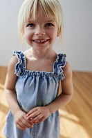 SHORT DENIM RUFFLE ROMPER