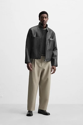 BLOUSON EN CUIR À POCHES