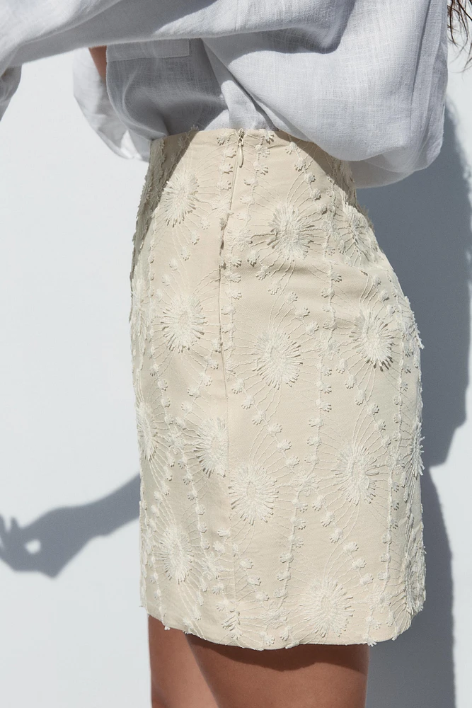 MINI SKIRT WITH FRAYED EMBROIDERY