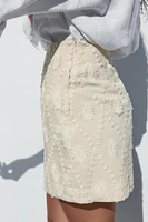 MINI SKIRT WITH FRAYED EMBROIDERY