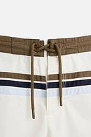 MAILLOT DE BAIN LONG À BANDES